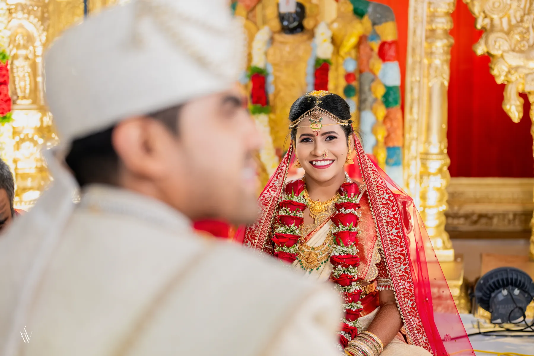 Bride and groom sharing a quiet look