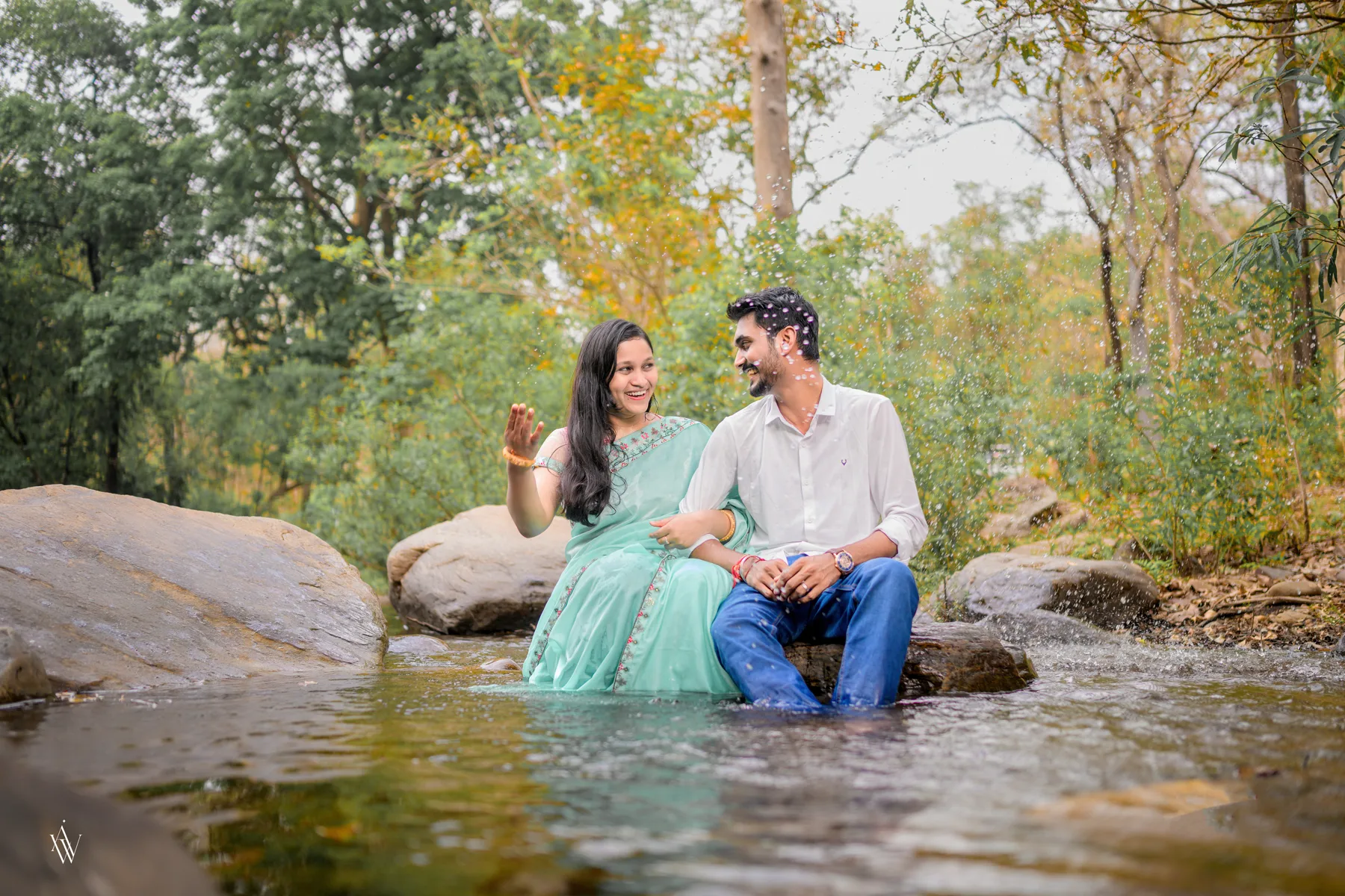 Wedding couple embracing outdoors