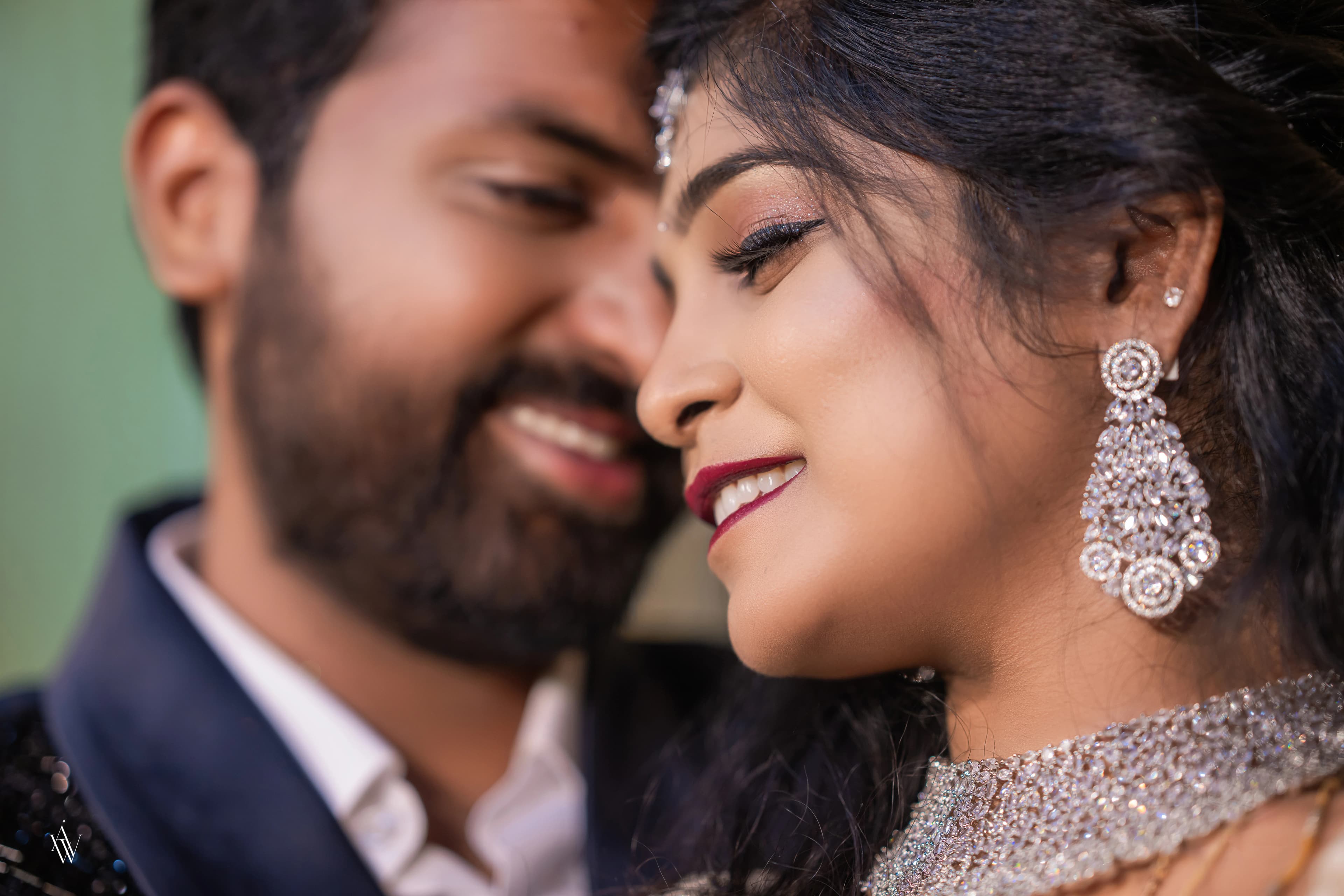 A newlywed couple sharing a quiet smile
